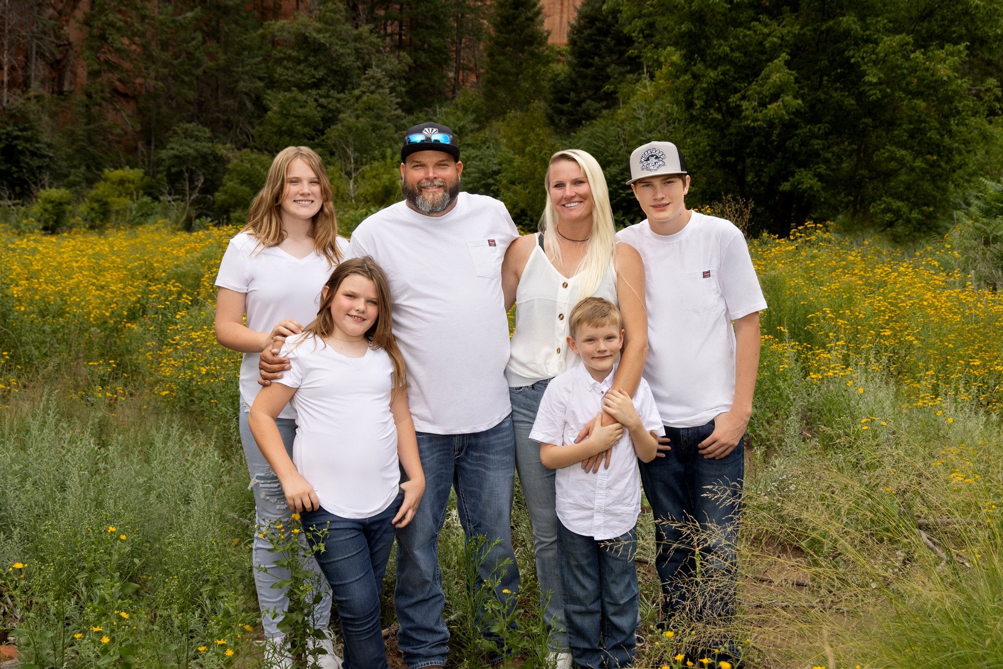 Family portrait smiling outdoors